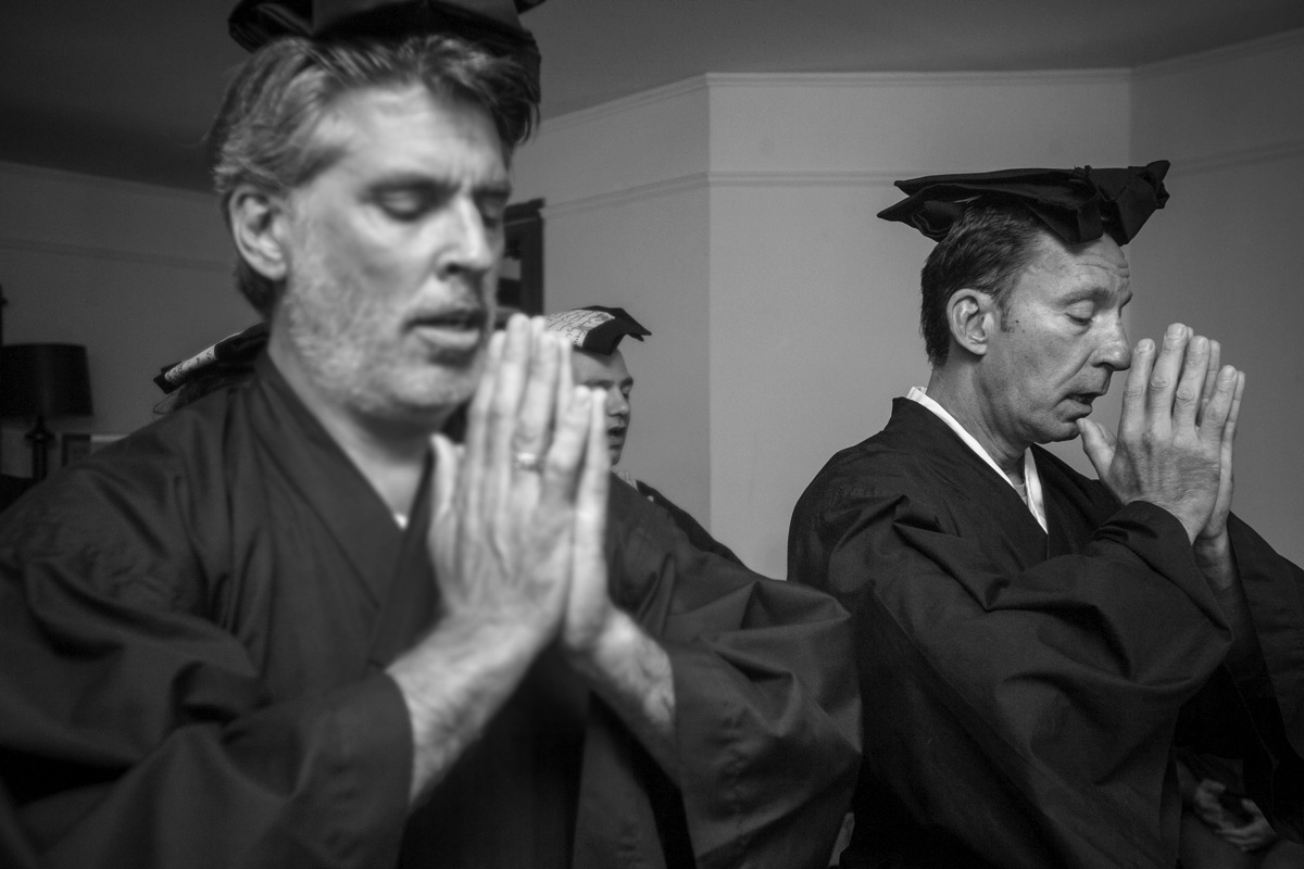 The jukai recipients chant the Verse of the Kesa