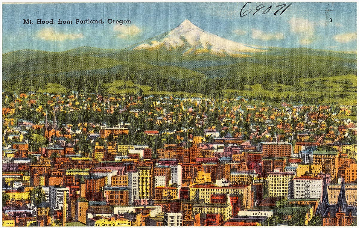 Description: Brightly colored 1930s postcard, depicting the town of Portland in the foreground with green valleys and the white-capped Mount Hood in the background.